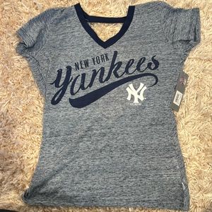 New with Tags Womans New York Yankee top with fashionable crisscross back